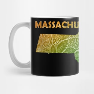 Colorful mandala art map of Massachusetts with text in green and orange Mug